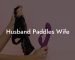 Husband Paddles Wife